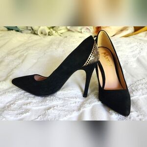 Velvet black heels with gold metal detail on heel